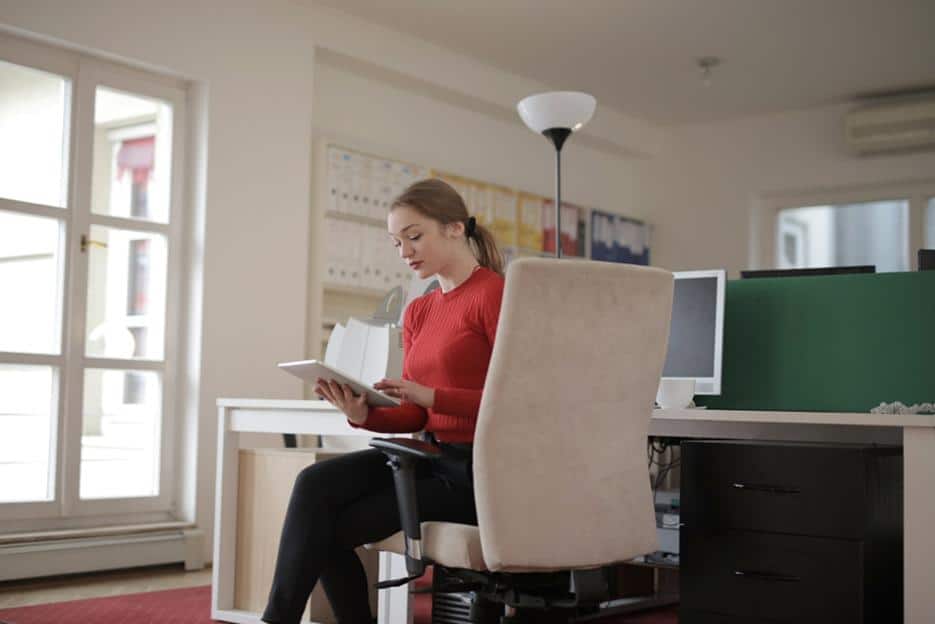 Woman Going Over Company Financial Records